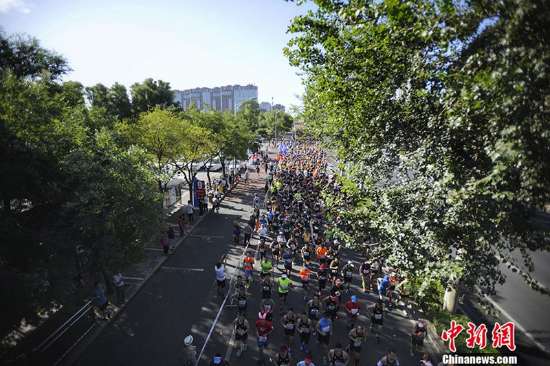 30.000 L?ufer beteiligen sich am Beijing Marathon 2017